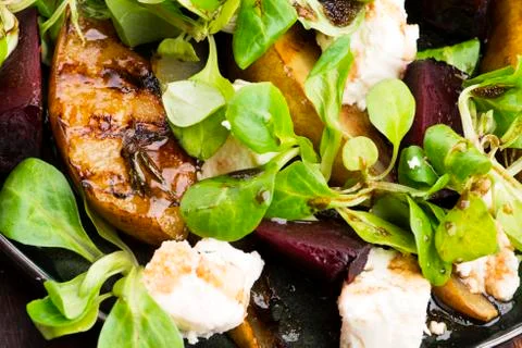 Salad of roasted beetroot, pear, lamb's lettuce, cheese Stock Photos