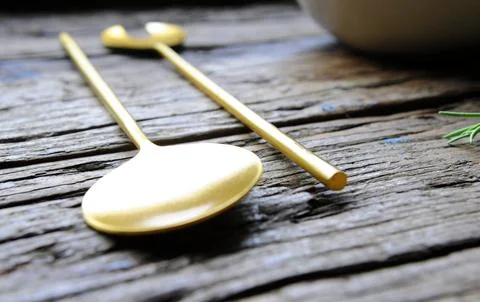 Salad servers on wooden pattern Stock Photos