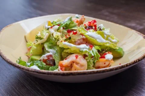 Salad with shrimp and caviar Stock Photos