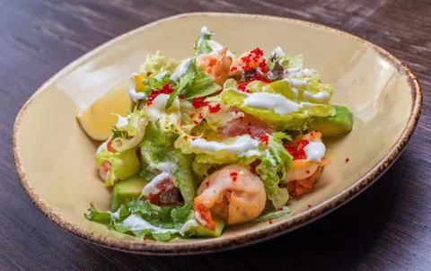 Salad with shrimp and caviar Stock Photos