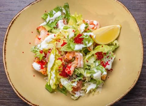 Salad with shrimp and caviar Stock Photos