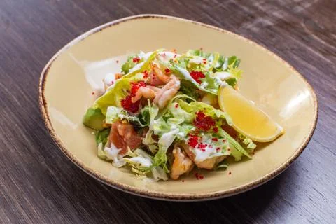 Salad with shrimp and caviar Stock Photos
