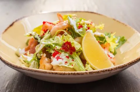 Salad with shrimp and caviar Stock Photos