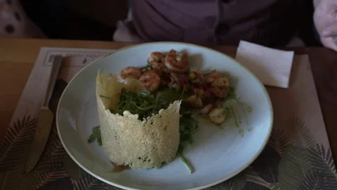 Salad with shrimps, arugula and cheese chips Stock Footage 248540468
