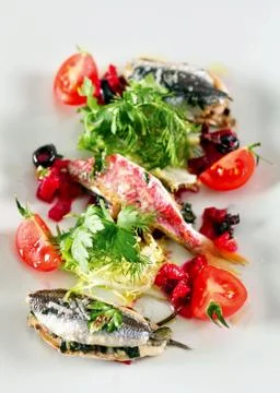Salad with stuffed fish Stock Photos