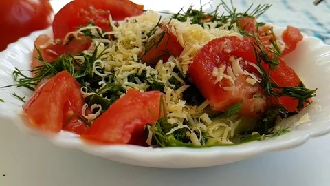 Salad tomato dill cheese fork slow-motion Stock Footage 90033553