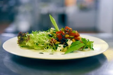 Salad with tomatoes Stock Photos