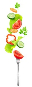 Salad vegetables over a fork Stock Photos