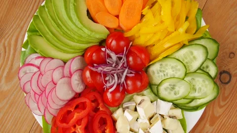 Salad of vegetables on a plate. Stock Footage 234726700