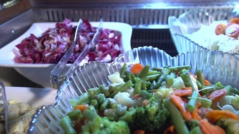 Salad vegetables slow camera pan to the right 動画素材 77559756