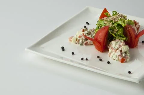 Salad in a white plate Stock Photos