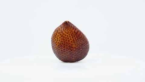 Salak Snake Fruit Rotating on White Background Isolated Stock Footage 325385753