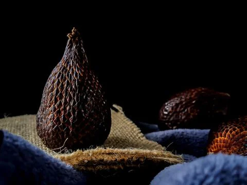 Salak is a type of palm fruit commonly eaten. snake fruit, its scientific n.. Stock Photos