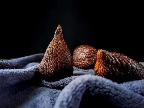 Salak is a type of palm fruit commonly eaten. snake fruit, its scientific n.. Stock Photos
