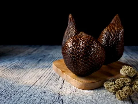 Salak is a type of palm fruit commonly eaten. snake fruit, its scientific n.. Stock Photos