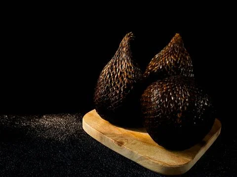 Salak is a type of palm fruit commonly eaten. snake fruit, its scientific n.. Stock Photos