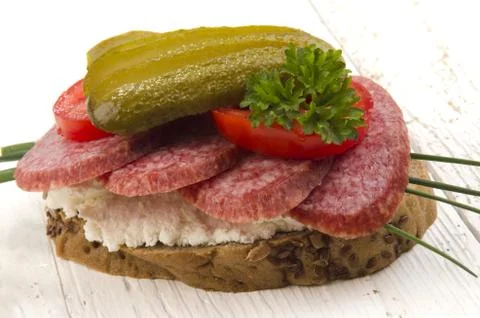 Salami bread with gherkin Stock Photos