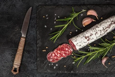 Salami on dark background Foto stock