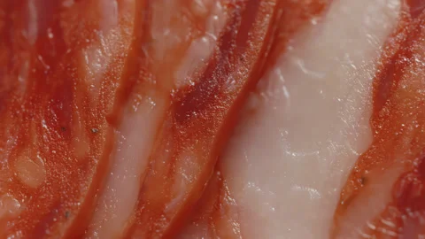 Salami meat slices macro close up presentation slowly rotating stock footage Stock Footage 344705520