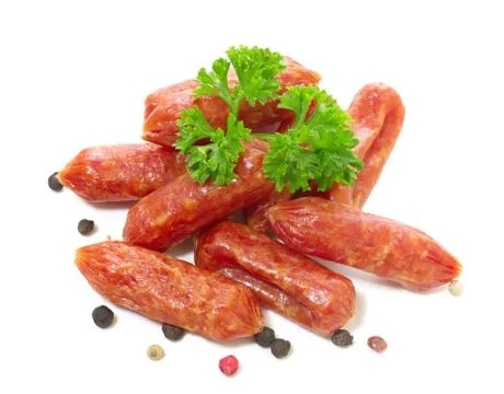 Salami with pepper on white background Stock Photos