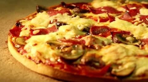 Salami pizza baking in the oven Stock Footage 24673298