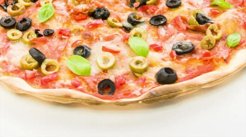 Salami pizza with basil Stock Footage 36308920