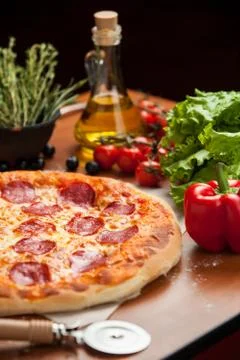 Salami pizza on the table Stock Photos