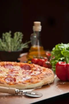 Salami pizza on the table Stock Photos