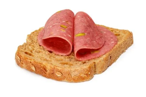 Salami slices and bread slice isolated Foto stock