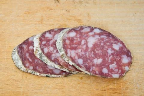 Salami slices Stock Photos