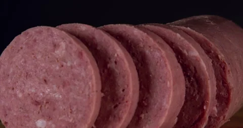 Salami Slices shot in a studio Stock Footage 243370051