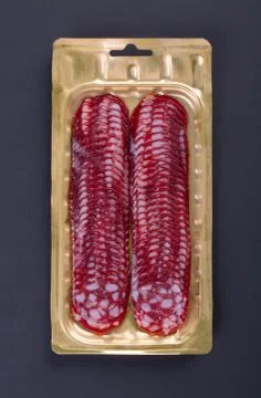 Salami slicing Stock Photos