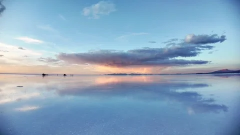 Salar de Uyuni Mirror Effect at Sunset with Stormy Clouds - Bolivia 動画素材 332727071