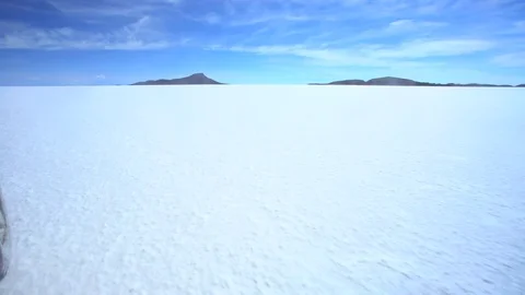 Salar de Uyuni Plateau Bolivian Road Trip in a 4x4 vehicle travelling at speed Stock Footage