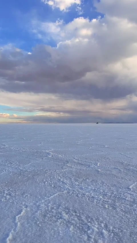 Salar de Uyuni Salt Flat Landscape under Cloudy Sky in Bolivia Stock Footage 335941490