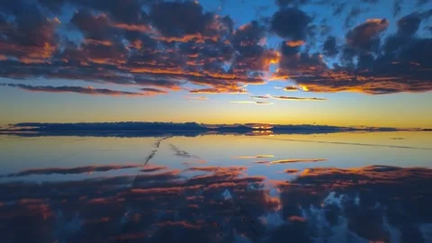 Salar de Uyuni Sunset Mirror Low Flying Drone Bolivia 4K Stock Footage 332176603
