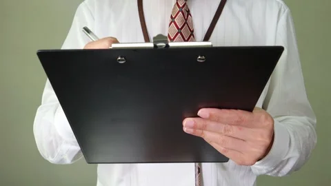 A salaryman who writes Stock Footage 336587589