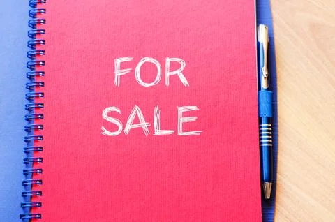 For sale write on notebook Stock Photos