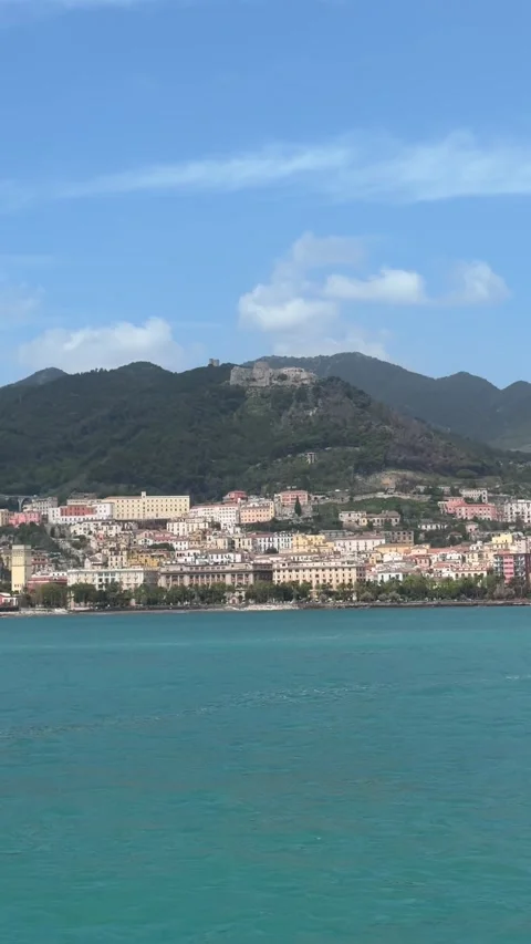 Salerno city viewed from a moving ferry with coastline and mountains in the back Video stock 332973653