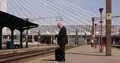 Sales Agent Travel Business Waiting Departure Train Station Platform Read News 4k or 4k+ Resolution