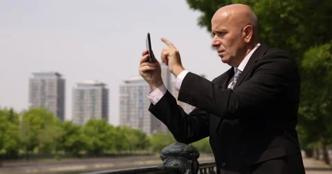 Sales Agent Use Tablet Access Business Website Browse Internet Financial News Video stock 58102180