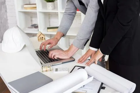 Sales agent using laptop Stock Photos