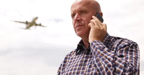 Sales Agent Using Mobile Phone Talk Business Problem Airport Plane Landing Area 스톡 동영상 53892198