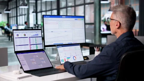 Sales Analyst Reviews Customer Data On Touchscreen Stock Footage 345857848