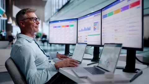 Sales Analyst Studies Customer Data On Laptop Stock Footage 344710734