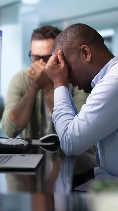 Sales Analysts Look Stressed Using CRM Software On Computer Stock Footage 345313108