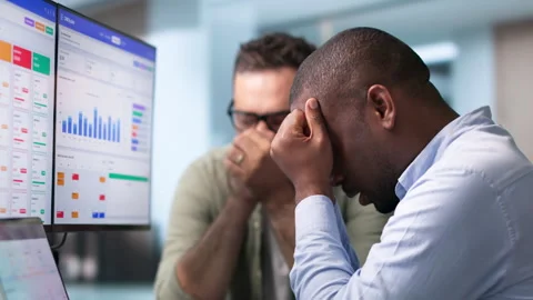 Sales Analysts Look Stressed Using CRM Software On Computer Stock Footage 346321951