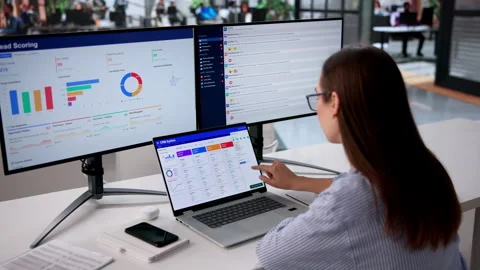 Sales Manager Analyzing CRM Software Data On Computer Video stock 334524013