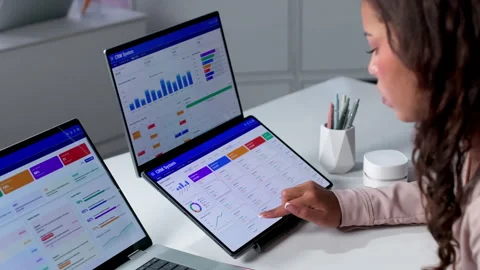 Sales Manager Analyzing Customer Data On Laptop Stock Footage 335882631