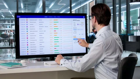 Sales Manager Configures Pricing Software Stock Footage 333847808